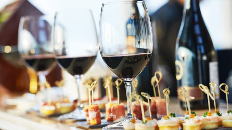 Wine glasses and small bites